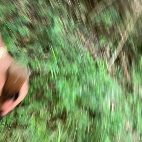 a man that is standing in the grass