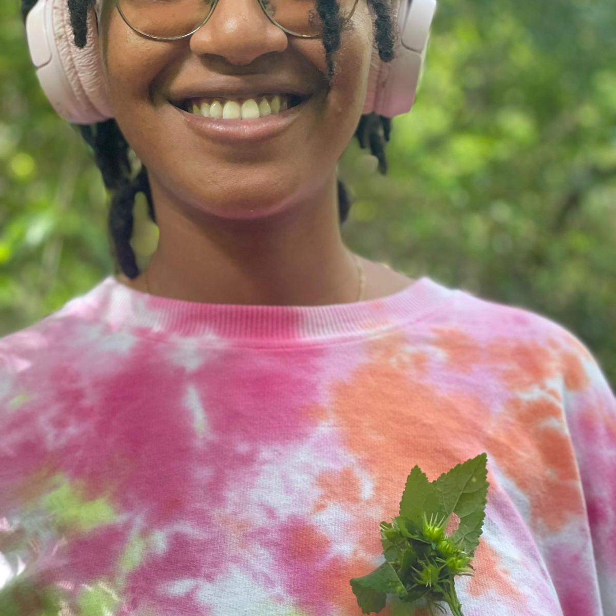 a close up of a person wearing glasses